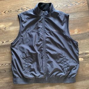 Greg Norman fleece lined vest.  Dark grey size XL.  Like new.